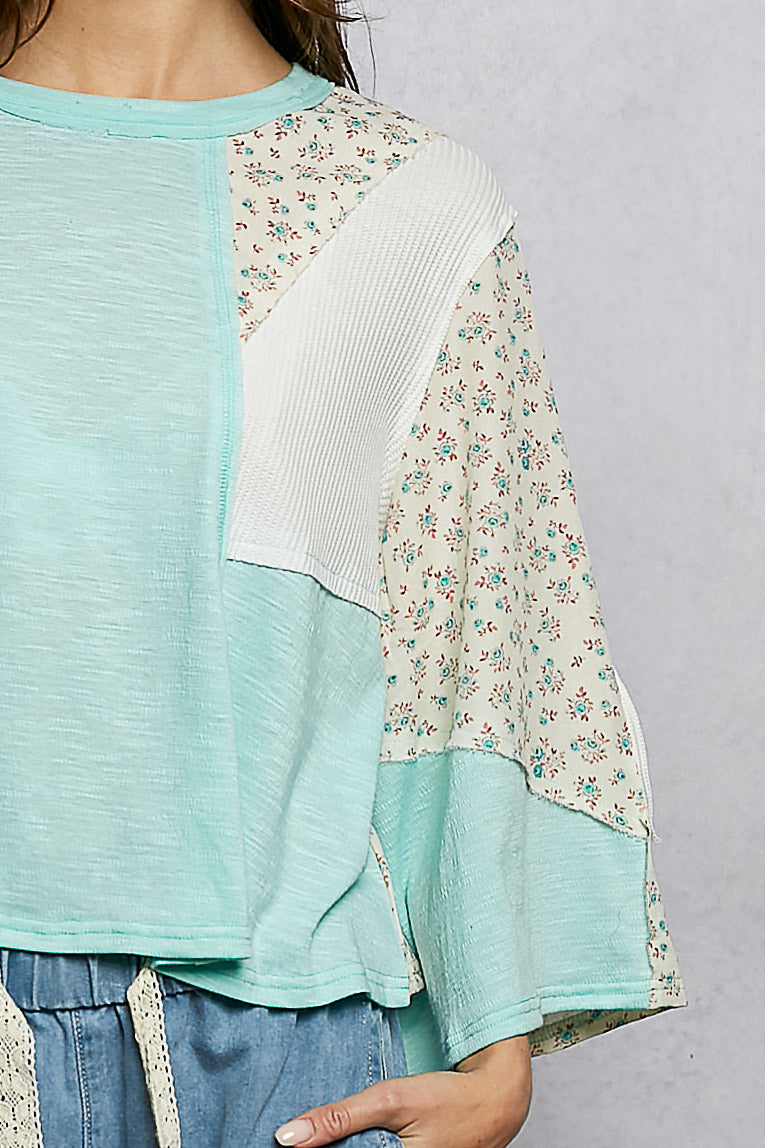 POL Exposed Seam Floral Patchwork Round Neck Textured Slub Knit Top in Aqua