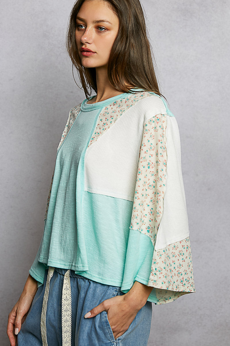 POL Exposed Seam Floral Patchwork Round Neck Textured Slub Knit Top in Aqua