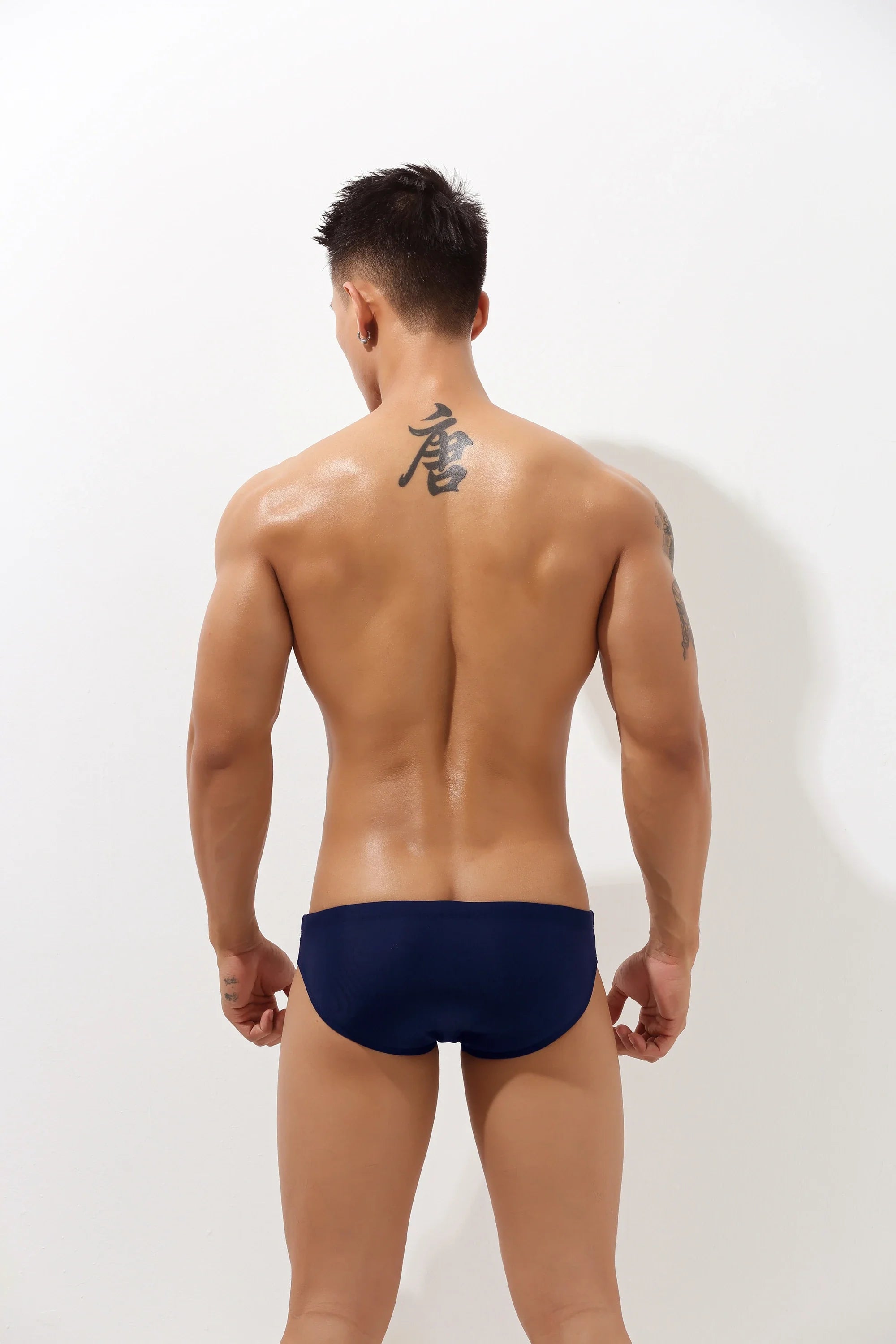 Sexy Low-Rise Swim Briefs for Men with Hollow Design