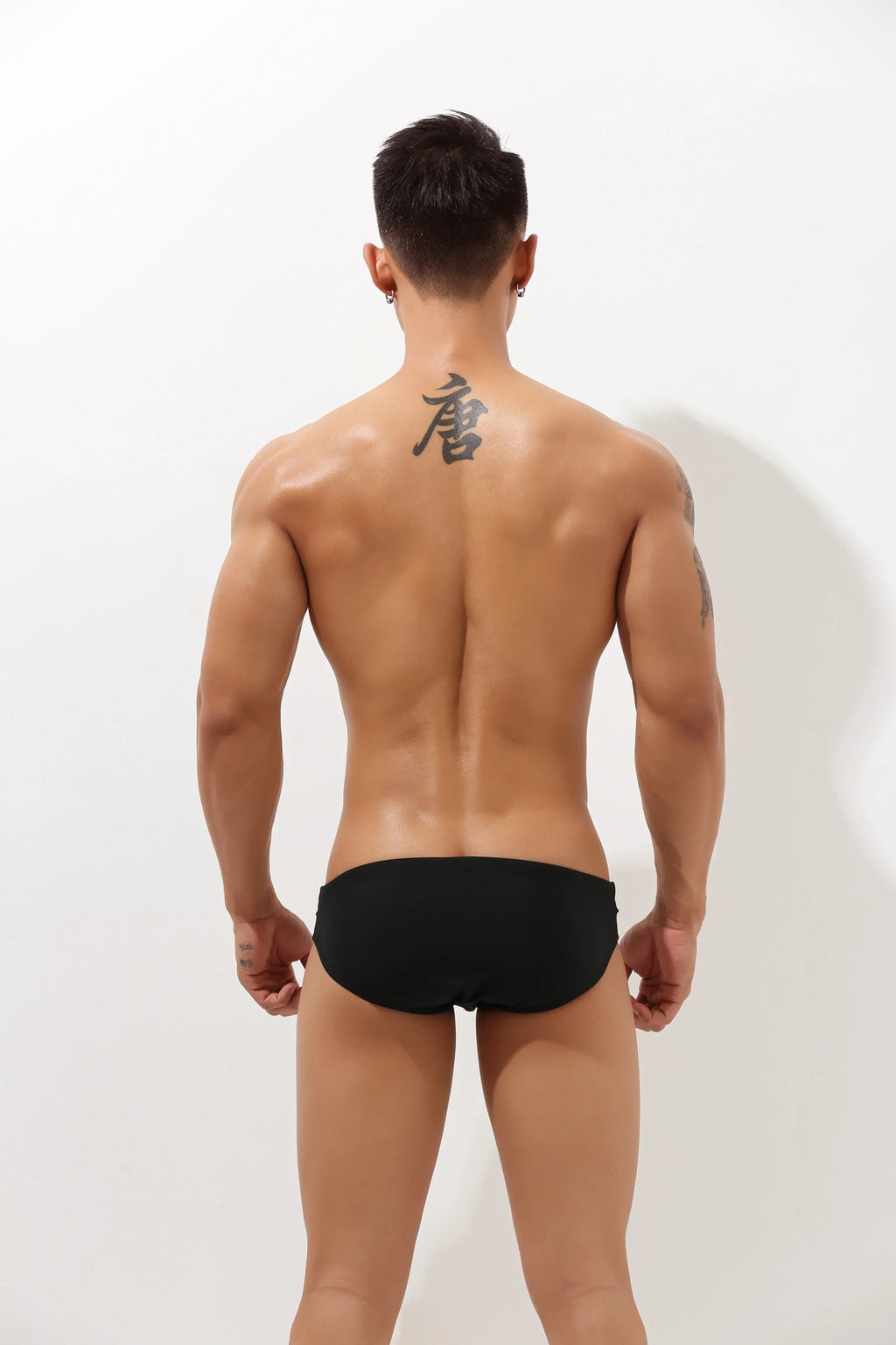 Sexy Low-Rise Swim Briefs for Men with Hollow Design